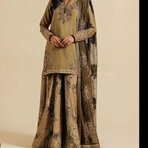 Elegant Olive Green Lehenga with Intricate Embroidery
